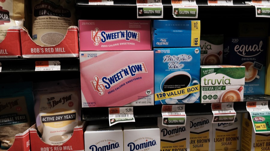 Products containing the artificial sweetener Aspartame, including Sweet'N Low, are displayed on a store shelf on July 14, 2023 in New York City.