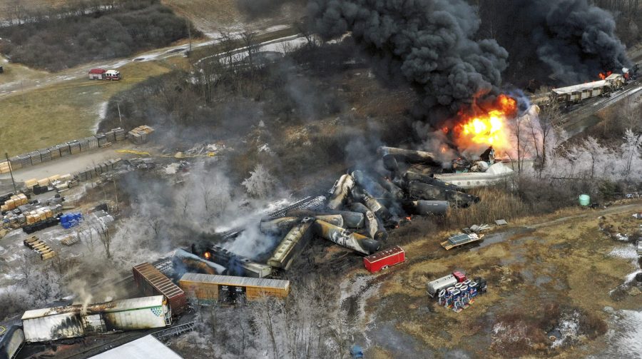 FILE - In this photo taken with a drone, portions of a Norfolk Southern freight train that derailed the previous night in East Palestine, Ohio, remain on fire at mid-day, Feb. 4, 2023. (AP Photo/Gene J. Puskar, File)