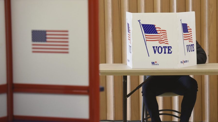 FILE - A resident votes at the Zion St. Joe United Church of Christ on Election Day, Nov. 3, 2020, in St. Joseph, Mich. (Don Campbell/The Herald-Palladium via AP, File)