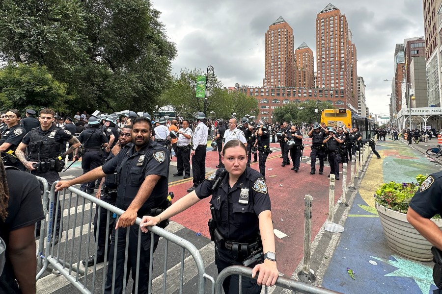 New York Police put up barricades in Union Square, Friday, Aug. 4, 2023, in New York. Police in New York City are struggling to control a crowd of thousands of people who gathered in Manhattan's Union Square for an Internet personality's videogame console giveaway that got out of hand. (AP Photo/Brooke Lansdale)