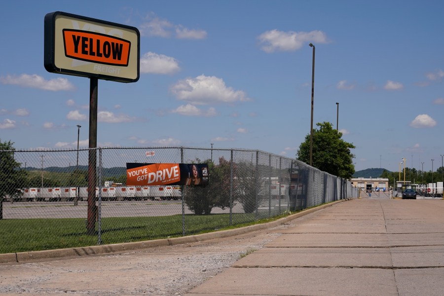 FILE - A sign for Yellow Corp. trucking company stands outside its facility on July 31, 2023, in Nashville, Tenn. Investors recently drove up shares of trucking giant Yellow Corp., which on Sunday, Aug,. 6, 2023, filed for bankruptcy, and Tupperware, which earlier this year warned that it was in dire financial shape. (AP Photo/George Walker IV, File)