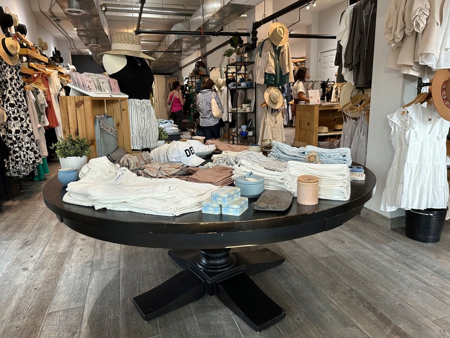 Items are displayed in a boutique along Tennyson Street Saturday, Aug. 5, 2023, in northwest Denver. The Commerce Department releases U.S. retail sales data for July. (AP Photo/David Zalubowski)