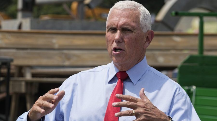 Republican presidential candidate and former Vice President Mike Pence speaks with the media during a campaign stop on Wednesday, Aug. 2, 2023, in Indianapolis.