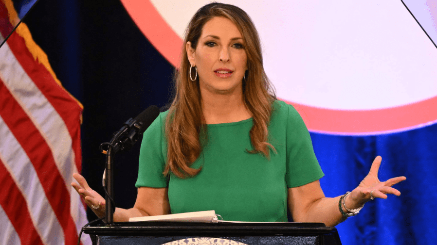 Ronna McDaniel gestures while speaking at a Republican National Committee meeting.