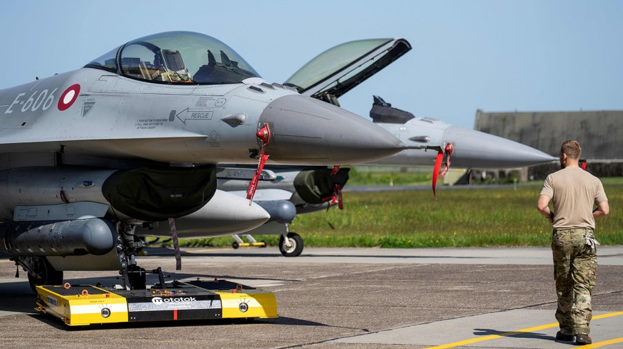 A Danish F-16 fighter jet is pictured at the Fighter Wing Skrydstrup Air Base near Vojens, Denmark on May 25, 2023.