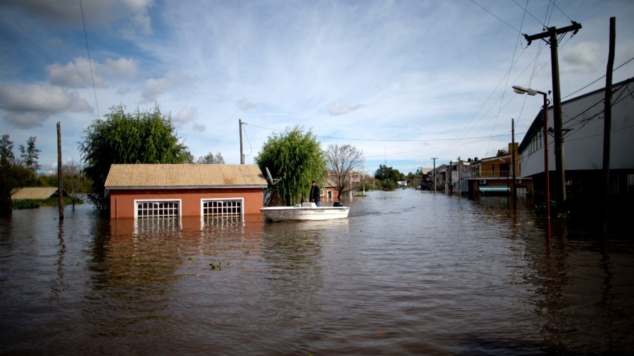 Roads are flooded in Villa Paranacito, Entre Rios, Argentina, Thursday, April 28, 2016. A new study Thursday, May 18, 2023, finds the natural burst of El Nino warming that changes weather worldwide is far costlier with longer-lasting expenses than experts had thought, averaging trillions of dollars in damage. (AP Photo/Natacha Pisarenko, File)