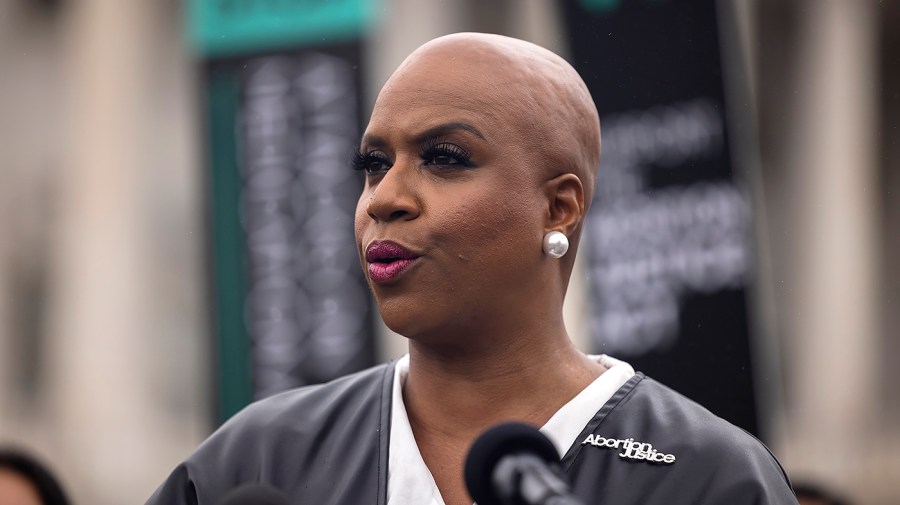 Representative Ayanna Pressley speaks during a press conference.