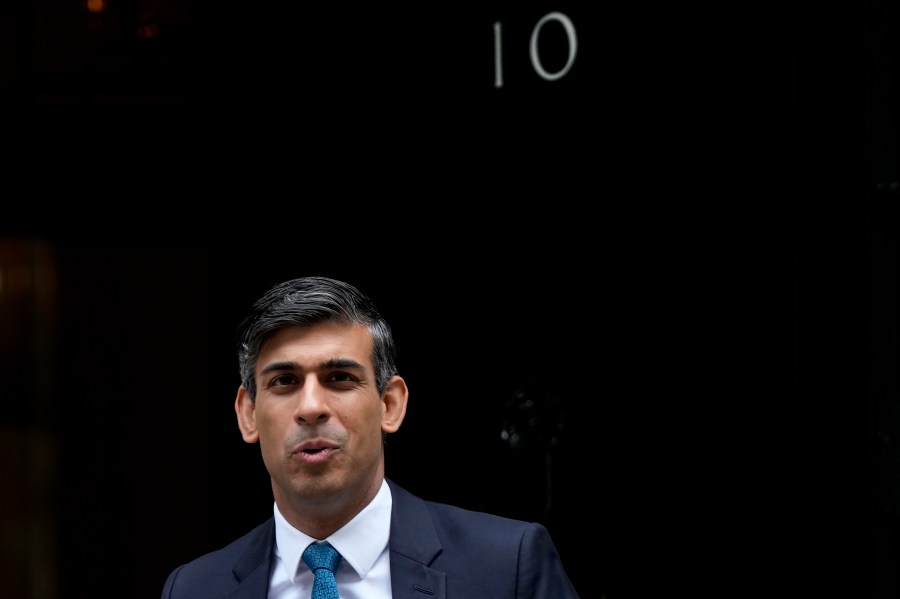 FILE - Britain's Prime Minister Rishi Sunak leaves 10 Downing Street to attend the weekly Prime Ministers' Questions session in parliament in London, on July 19, 2023. British lawmakers headed back to Parliament on Monday Sept. 4, 2023 after their summer break. But thousands of U.K. children won’t be returning to their classrooms this week, because their schools are at risk of collapse from crumbling concrete. (AP Photo/Frank Augstein, File)