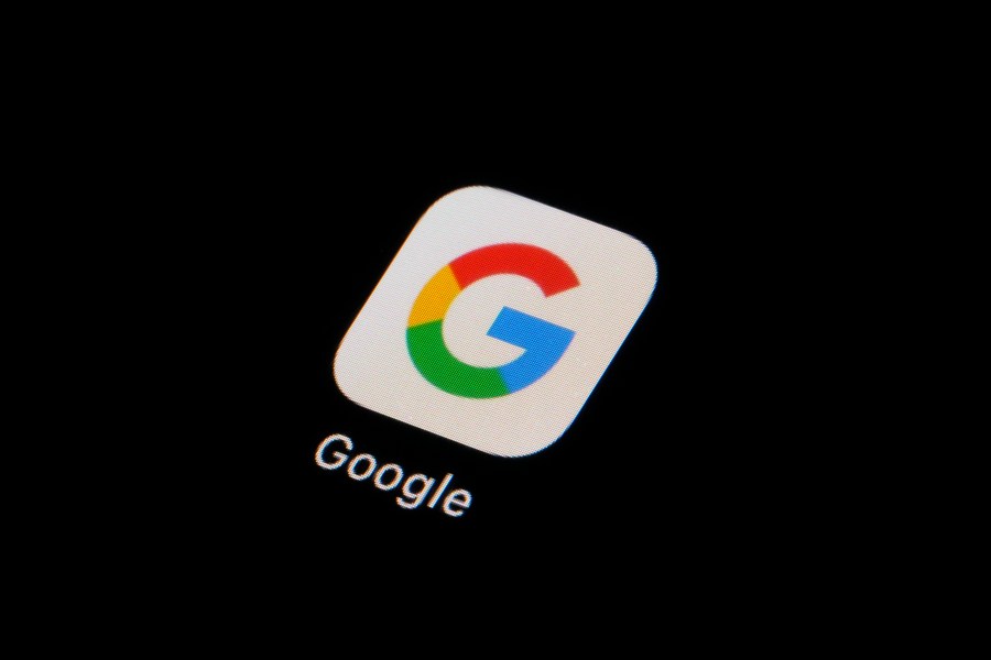 FILE - The Google app icon is seen on a smartphone, Tuesday, Feb. 28, 2023, in Marple Township, Pa. Google, on Thursday, Sept. 7, will soon require political advertising that incorporates artificial intelligence come with a prominent disclosure that the technology is being used to depict real or realistic-looking people or events. The use of AI has already begun to seep into that space and last month Federal Election Committee said that it may soon regulate AI-generated deepfakes in political ads ahead of the 2024 election.(AP Photo/Matt Slocum, File)