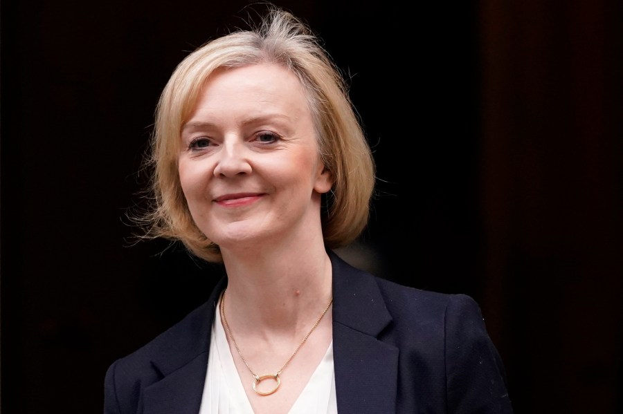 FILE - Britain's Prime Minister Liz Truss leaves 10 Downing Street to attend the weekly Prime Ministers' Questions session in parliament in London, on Oct. 19, 2022. Former British Prime Minister Liz Truss has a book coming out next spring in which she will reflect on her years in government, offer advice for future leaders and recall lessons she learned while often being “the only conservative in the room.” (AP Photo/Alberto Pezzali, File)