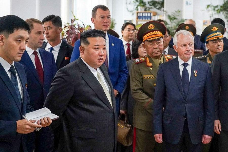 ADDS DATE - In this photo released by the governor of the Russian far eastern region of Khabarovsky Krai region Mikhail Degtyarev telegram channel, North Korean leader Kim Jong Un, center left, visits a Russian aircraft plant that builds fighter jets in Komsomolsk-on-Amur, about 6,200 kilometers (3,900 miles) east of Moscow, Russia Friday, Sept. 15, 2023.. (The governor of the Russian far eastern region of Khabarovsky Krai region Mikhail Degtyarev telegram channel via AP)