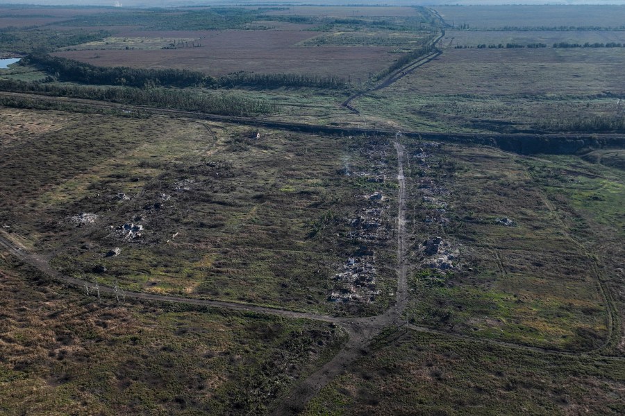 This drone image on Wednesday Sept. 6, 2023, shows houses seen destroyed during the fighting between Russian and Ukrainian armed forces are seen in Andriivka, Donetsk region, Ukraine. Deputy Defense Minister Hanna Maliar said this morning Ukraine's General Staff officially confirmed that Ukrainian troops captured Andriivka, which is 10 km south of Bakhmut. (AP Photo/Evgeniy Maloletka)