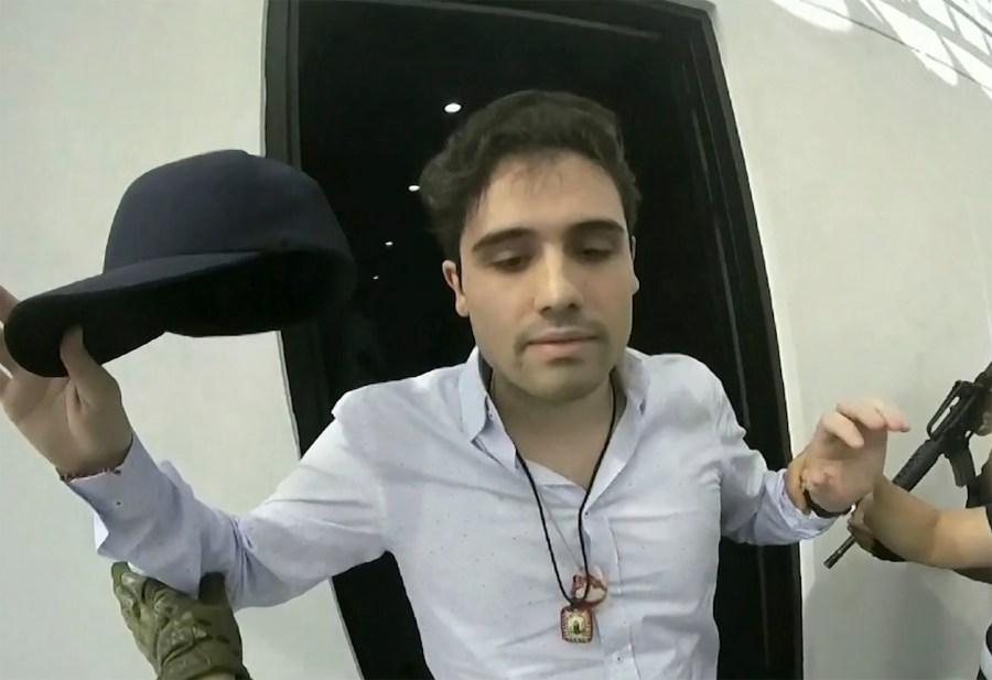 FILE - This frame grab from video, provided by the Mexican government, shows Ovidio Guzman Lopez being detained in Culiacan, Mexico, Oct. 17, 2019. Mexico extradited Guzman Lopez, a son of former Sinaloa cartel leader Joaquin “El Chapo” Guzmán, to the United States on Friday, Sept. 15, 2023, to face drug trafficking charges, U.S. Attorney General Merrick Garland said in a statement. (CEPROPIE via AP File)