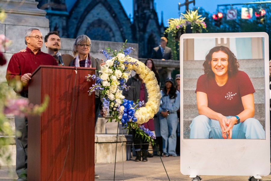 Frank LaPere, Nico LaPere and Caroline Frank, the family of Pava LaPere, founder of tech startup EcoMap Technologies, speak during a vigil on Wednesday, Sept. 27, 2023, in Baltimore. Loved ones are remembering the slain Baltimore tech entrepreneur for her compassion and dedication to helping others. Baltimore police found 26-year-old Pava LaPere dead from blunt force trauma in her apartment complex after she was reported missing late Monday morning. (AP Photo/Stephanie Scarbrough)