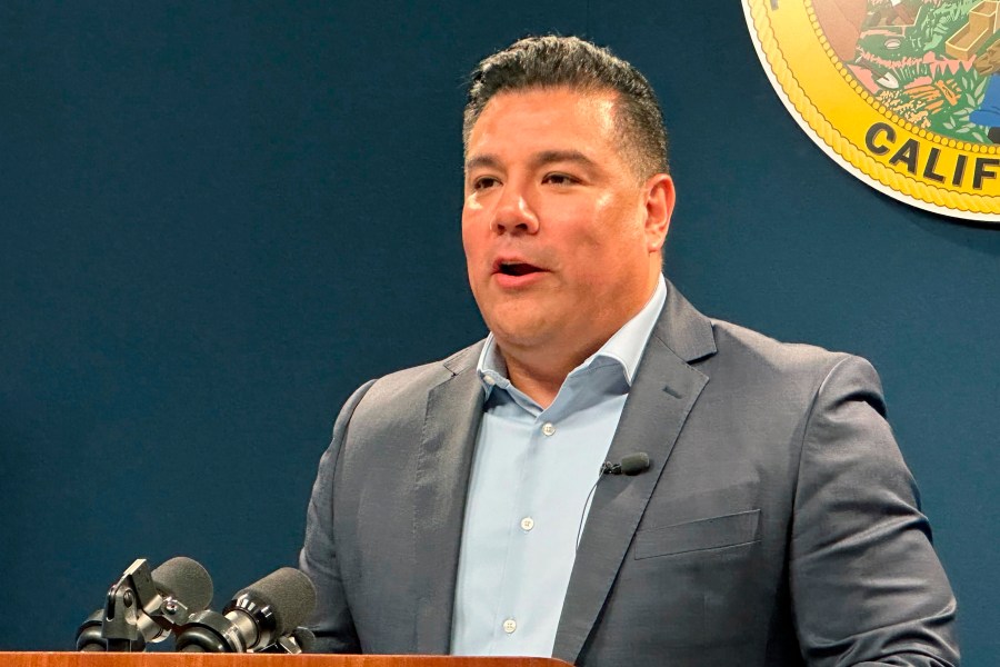 California Insurance Commissioner Ricardo Lara speaks during a news conference in a Sacramento, Calif., on Thursday, Sept. 21, 2023. Lara announced a new plan aimed at keeping insurance companies from leaving the wildfire-prone state. (AP Photo/Adam Beam)