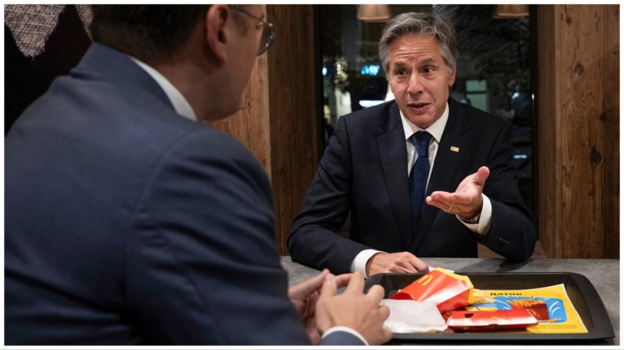 Ukraine Foreign Minister Dmytro Kuleba and U.S. Secretary of State Antony Blinken speak as they eat at a McDonald's in Kyiv, Ukraine, Wednesday, Sept. 6, 2023. (Brendan Smialowski/Pool via AP)