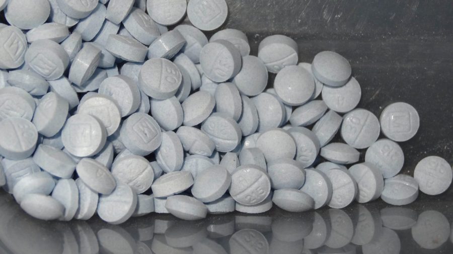 A close-up of a bag full of pills.