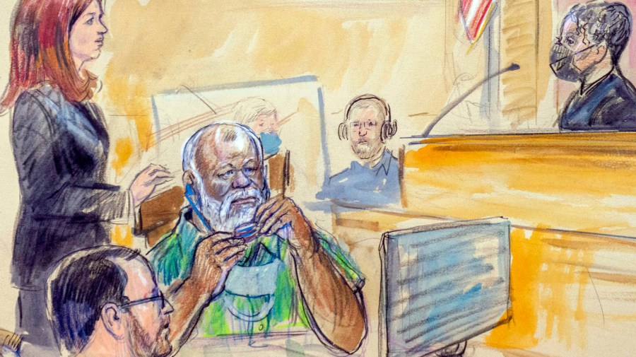 The artist sketch depicts Assistant U.S. Attorney Erik Kenerson, front left, watching as Whitney Minter, a public defender from the eastern division of Virginia, stands to represent Abu Agila Mohammad Mas'ud Kheir Al-Marimi, accused of making the bomb that brought down Pan Am Flight 103 over Lockerbie, Scotland, in 1988, in federal court in Washington, Monday, Dec. 12, 2022, as Magistrate Judge Robin Meriweather listens.