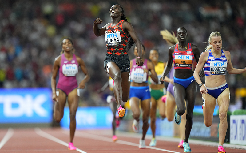 Mary Moraa, of Kenya leaps in the air and celebrates as she wins the gold medal ahead of Keely Hodgkinson, of Great Britain