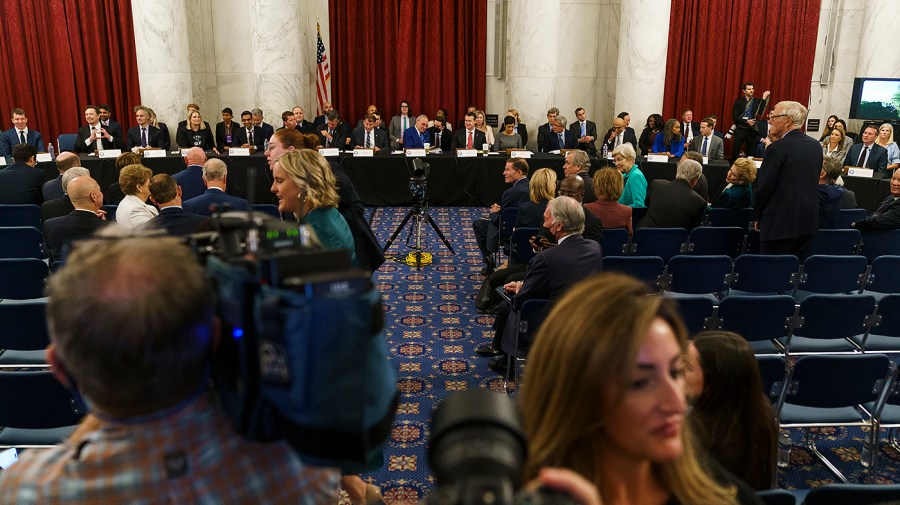 Senators and guest speakers are seen during a photo op prior to a Senate Artificial Intelligence Insight Forum