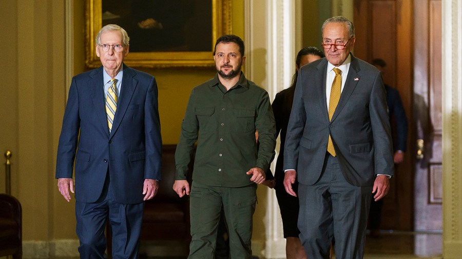 Ukrainian President Volodymyr Zelensky arrives to the Senate accompanied by Minority Leader Mitch McConnell (R-Ky.) and Majority Leader Chuck Schumer (D-N.Y.)