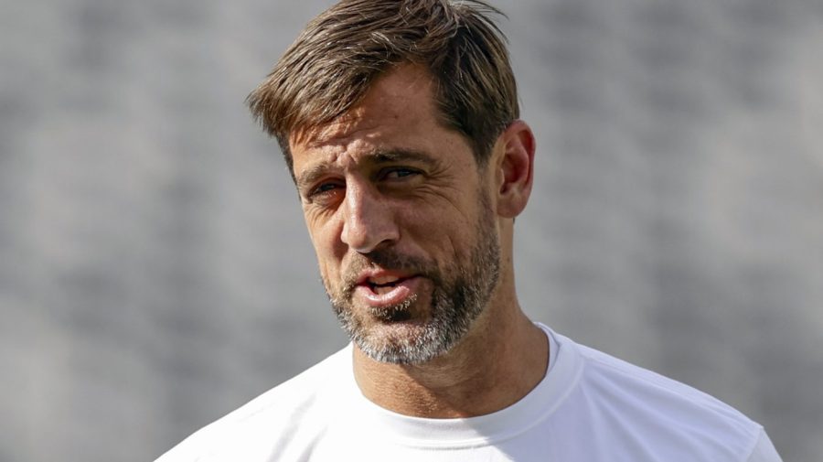 FILE - New York Jets quarterback Aaron Rodgers (8) practices before an NFL preseason football game against the New York Giants, Saturday, Aug. 26, 2023, in East Rutherford, N.J. Rodgers will make his first public media appearance, Friday, Sept. 15, since tearing the Achilles tendon in his left foot four snaps into his debut with his new team Monday night.(AP Photo/Adam Hunger, File)