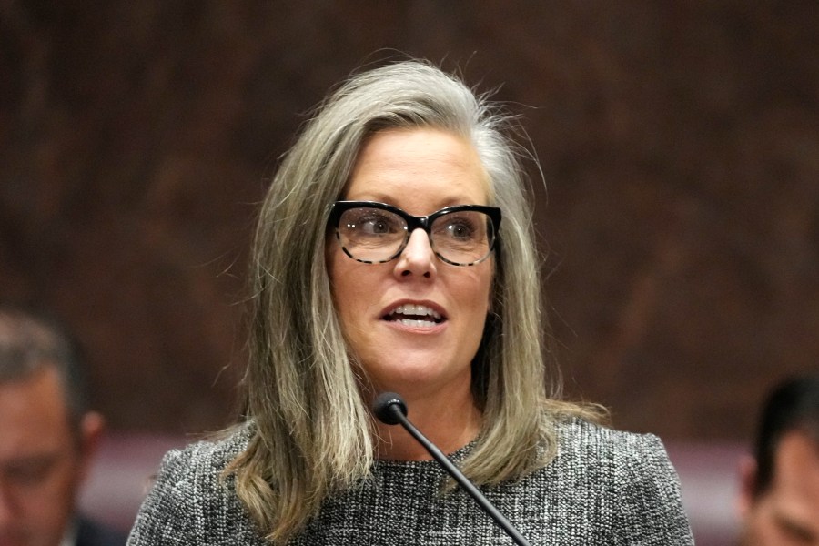 FILE - Arizona Democratic Gov. Katie Hobbs speaks as she gives the State of the State address, Jan. 9, 2023, at the Arizona Capitol in Phoenix. Hobbs said her administration was terminating land leases that for years have given a Saudi-owned farm nearly unfettered access to pump groundwater in the parched southwestern state. (AP Photo/Ross D. Franklin, File)