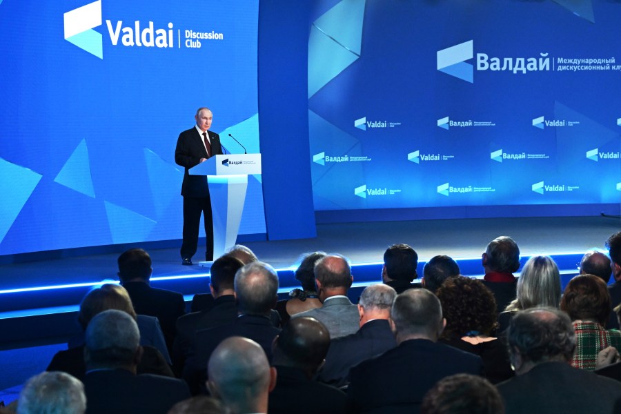 Russian President Vladimir Putin addresses the annual meeting of the Valdai Discussion Club in the Black Sea resort of Sochi, Russia, Thursday, Oct. 5, 2023. (Grigory Sysoyev, Sputnik, Kremlin Pool Photo via AP)