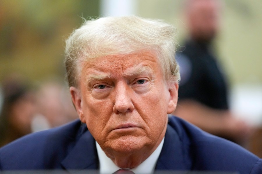 FILE - Former President Donald Trump sits in the courtroom before the continuation of his civil business fraud trial at New York Supreme Court, Tuesday, Oct. 3, 2023, in New York. Donald Trump’s lawyers asked a New York appeals court Friday to halt his Manhattan civil fraud trial while they fight a court ruling that calls for dissolving companies that control some of the former president’s most prized assets, including Trump Tower. (AP Photo/Seth Wenig, Pool)