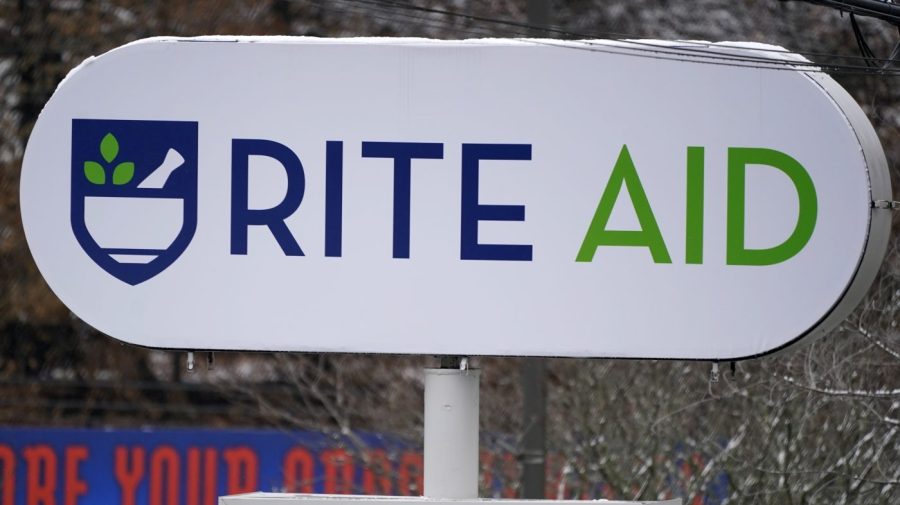 A Rite Aid sign stands in front of one of the drugstore's locations in Pittsburgh on Monday, Jan. 23, 2023. Rite Aid’s plan to close more stores as part of its bankruptcy process raises concern about how that might hurt access to medicine and care. The drugstore chain said late Sunday, Oct. 15, that its voluntary Chapter 11 process will allow it to speed up its plan to close underperforming stores. (AP Photo/Gene J. Puskar)