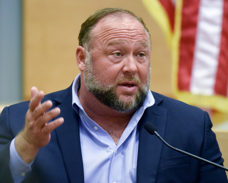 FILE - Conspiracy theorist Alex Jones takes the witness stand to testify at the Sandy Hook defamation damages trial at Connecticut Superior Court in Waterbury, Conn. Thursday, Sept. 22, 2022. A Texas judge has ruled that Jones cannot use bankruptcy protection to avoid paying nearly $1 billion to families who sued over his conspiracy theories that the Sandy Hook school massacre was a hoax. (Tyler Sizemore/Hearst Connecticut Media via AP, Pool, File)