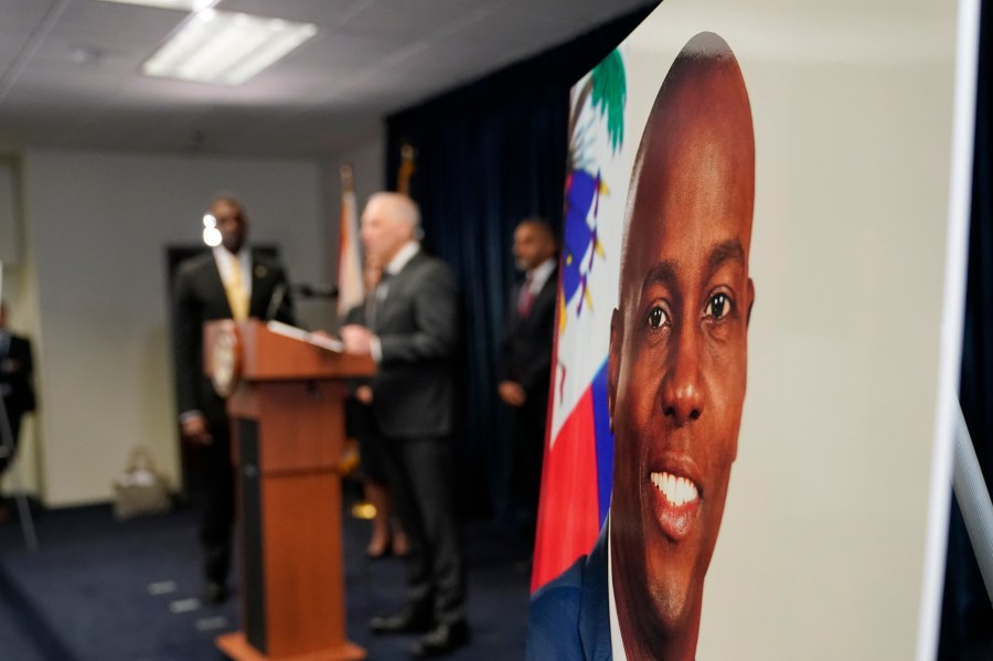 FILE - An image of Haitian President Jovenel Moïse is displayed at a news conference, Feb. 14, 2023, in Miami. A federal judge in Miami on Friday, Oct. 27, 2023 sentenced Germán Alejandro Rivera García, a retired Colombian army officer, to life in prison for his role in plotting to kill Moïse on July 7, 2021. He is the second of 11 suspects detained and charged in Miami to be sentenced. (AP Photo/Lynne Sladky, File)