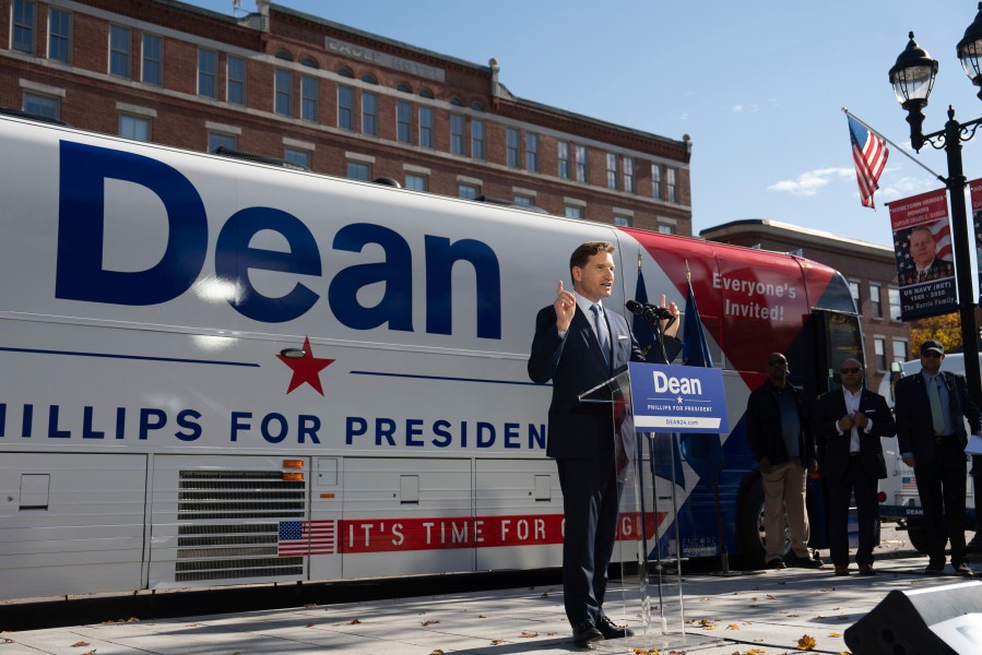 After signing a declaration of candidacy to run for president, Dean Phillips walked out of the New Hampshire Statehouse to address the crowd Friday, Oct. 27, 2023 Concord, Minn. (Glen Stubbe/Star Tribune via AP)