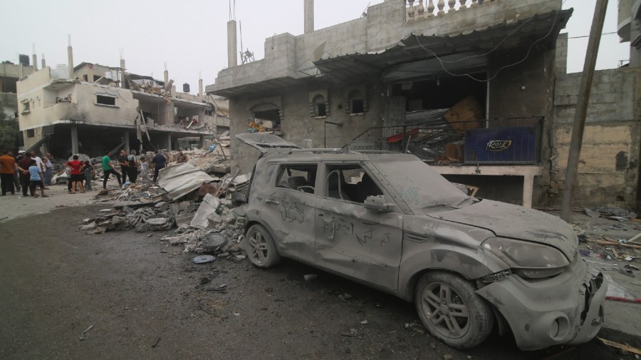 Palestinians look for survivors after the Israeli bombardment of the Gaza Strip in Rafah, Monday, Oct. 23, 2023.