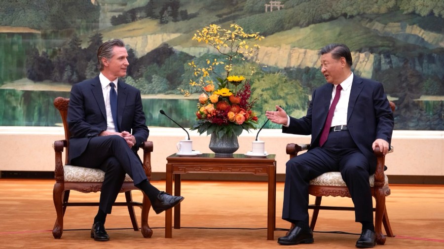 In this photo taken Wednesday, Oct 25, 2023, and released by Office of the Governor of California , California Gov. Gavin Newsom, left, meets with Chinese President Xi Jinping at the Great Hall of the People in Beijing.