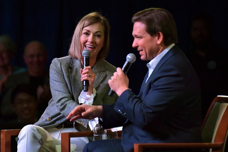 FILE - Florida Gov. Ron DeSantis speaks at an event with Iowa Gov. Kim Reynolds, Friday, March 10, 2023, in Davenport, Iowa. Iowa Gov. Kim Reynolds plans to endorse Ron DeSantis for president, giving the Florida governor's 2024 campaign a boost as he struggles to show progress against Donald Trump in the Republican primary, two people familiar with the matter said Sunday, Nov. 5. (AP Photo/Ron Johnson, File)