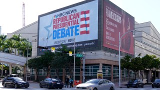A billboard announcing the third Republican presidential debate in Miami is shown, Tuesday, Nov. 7, 2023, in downtown Miami. Five hopefuls will participate in the debate at the Adrienne Arsht Center for the Performing Arts of Miami-Dade County, according to the Republican National Committee. They are Florida Gov. Ron DeSantis, businessman Vivek Ramaswamy, former U.N. Ambassador Nikki Haley, Sen. Tim Scott, R-S.C., and former New Jersey Gov. Chris Christie. (AP Photo/Wilfredo Lee)