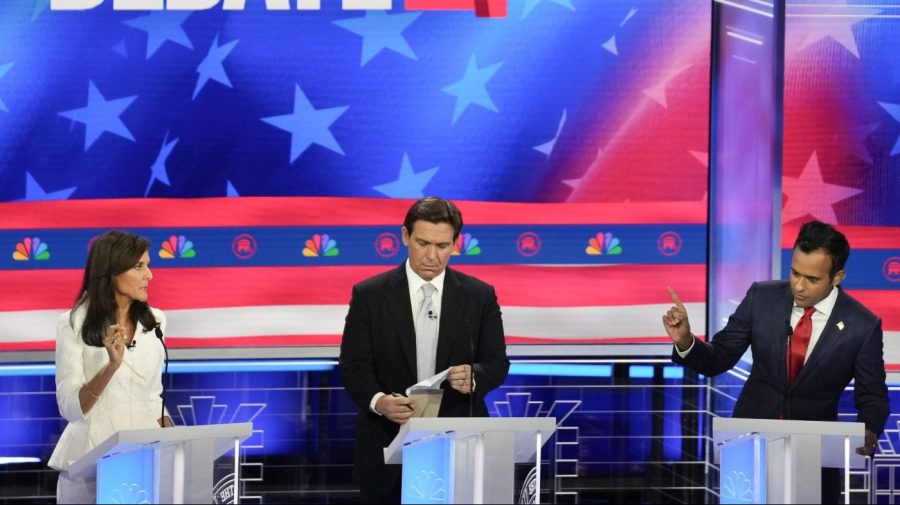 Republican presidential candidates from left, former UN Ambassador Nikki Haley, Florida Gov. Ron DeSantis, and businessman Vivek Ramaswamy, participate in a Republican presidential primary debate hosted by NBC News Wednesday, Nov. 8, 2023, at the Adrienne Arsht Center for the Performing Arts of Miami-Dade County in Miami. (AP Photo/Rebecca Blackwell)