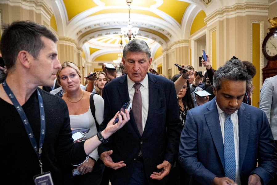 FILE - Sen. Joe Manchin, D-W.Va., speaks to reporters as he walks out of a closed-door caucus meeting after the House approved a 45-day funding bill to keep federal agencies open, Sept. 30, 2023, in Washington. Manchin announced he won't seek reelection in 2024, giving Republicans a prime opportunity to gain a seat in the heavily GOP state. (AP Photo/Andrew Harnik, File)