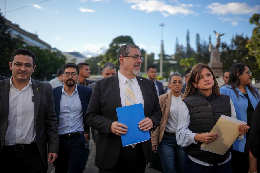 Guatemala's President-elect Bernardo Arévalo, Vice President-elect Karin Herrera, and Seed Movement legislators, arrive for a press conference in the Plaza of Human Rights in Guatemala City, Thursday, Nov. 16, 2023.