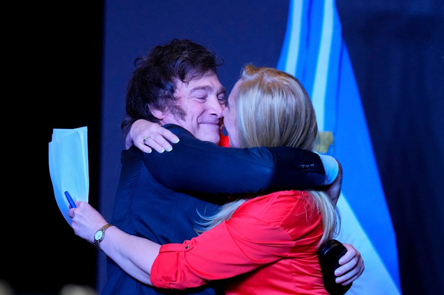 Javier Milei, presidential candidate of the Liberty Advances coalition, embraces his sister Karina Milei after being elected president in a runoff election in Buenos Aires, Argentina, Sunday, Nov. 19, 2023. (AP Photo/Natacha Pisarenko)