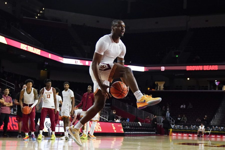 Southern California guard Bronny James warms up before an NCAA college basketball game against Brown, Sunday, Nov. 19, 2023, in Los Angeles. (AP Photo/Ryan Sun)