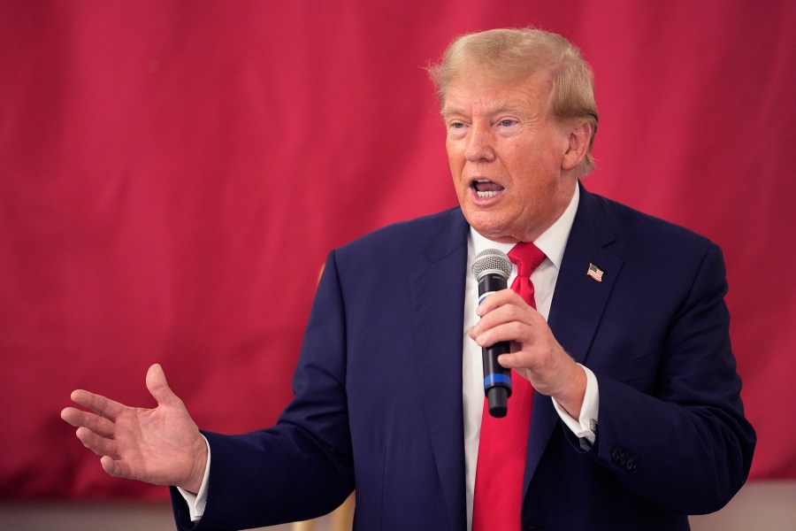 FILE - Republican presidential candidate and former President Donald Trump speaks to Texas state troopers and guardsmen at the South Texas International Airport, Sunday, Nov. 19, 2023, in Edinburg, Texas. A federal appeals court is hearing arguments Monday, Nov. 20, on whether to reinstate a gag order against Donald Trump in the federal case charging him with plotting to overturn the results of the 2020 presidential election. (AP Photo/Eric Gay, File)