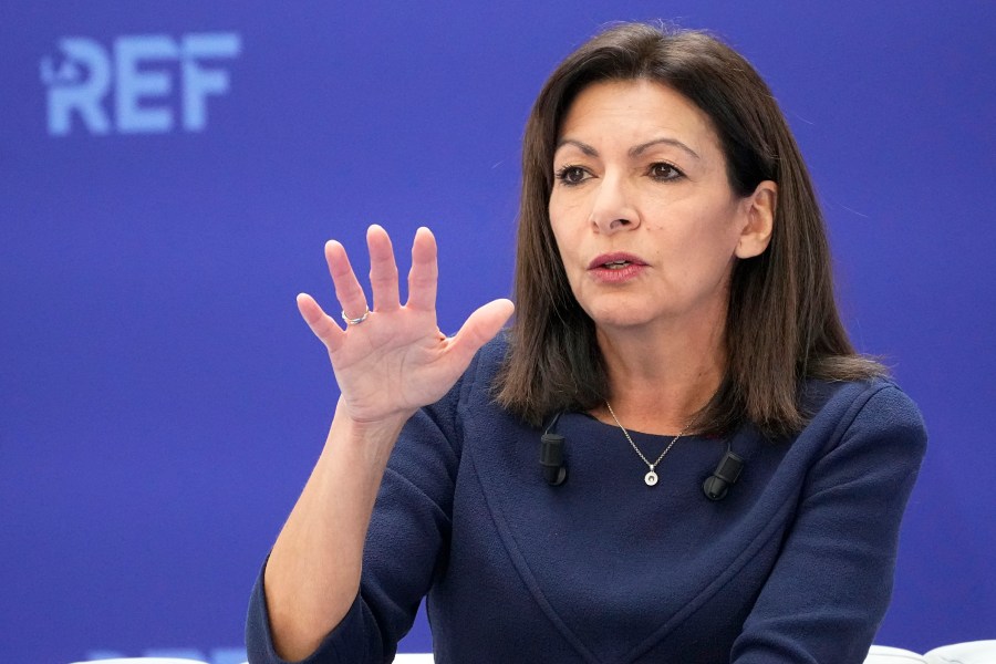 FILE - Paris Mayor Anne Hidalgo delivers her speech during a political meeting with the French Employers' association (MEDEF) at the Station F startup campus, in Paris, France, Monday, Feb. 21, 2022. The mayor of future Olympic host city Paris says she is quitting X, accusing Elon Musk's platform previously known as Twitter of spreading disinformation and hatred and of becoming a “gigantic global sewer” that is toxic for democracy and constructive debate. (AP Photo/Michel Euler, File)