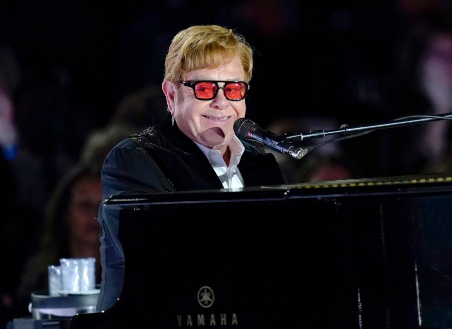 FILE - Elton John performs on the South Lawn of the White House in Washington, Friday, Sept. 23, 2022. Elton John is set to address Britain's Parliament on Wednesday, Nov. 29, 2023, on his work fighting HIV at an event to mark World AIDS Day. The British star's AIDS Foundation has led campaigns to extend a pilot government program to test people visiting hospitals' emergency departments for HIV. (AP Photo/Susan Walsh, File)