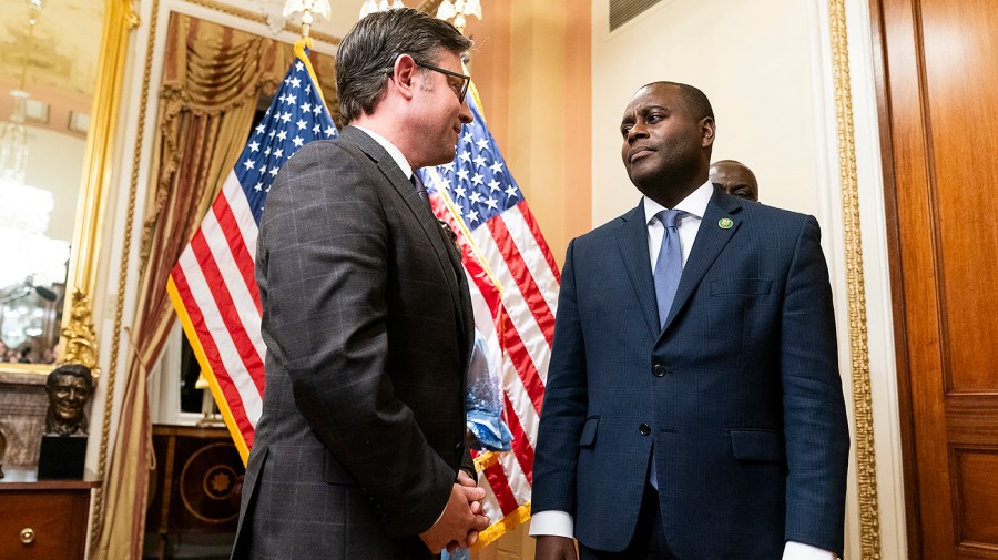 Speaker Mike Johnson (R-La.) and Rep. Gabe Amo (D-R.I.)