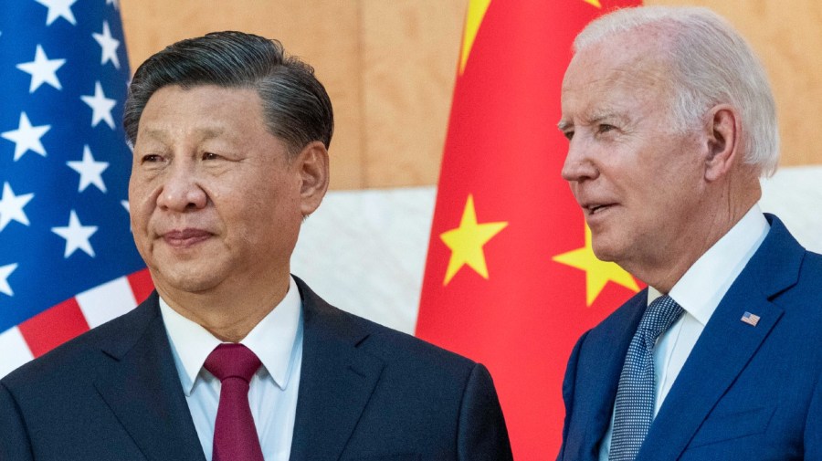 File - U.S. President Joe Biden, right, stands with Chinese President Xi Jinping before a meeting on the sidelines of the G20 summit meeting, Monday, Nov. 14, 2022, in Bali, Indonesia.