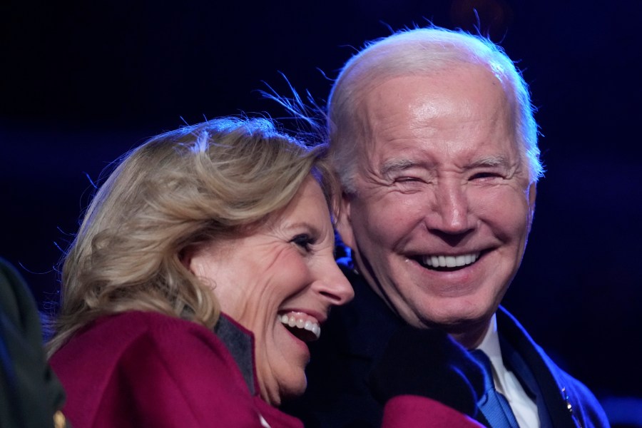 President Joe Biden and first lady Jill Biden listen to performances after lighting the National Christmas Tree on the Ellipse, near the White House, Thursday, Nov. 30, 2023, in Washington. (AP Photo/Andrew Harnik)