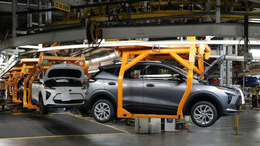 File - Vehicles move along the 2023 Chevrolet Bolt EV and EUV assembly line at the General Motors Orion Assembly June 15, 2023, in Lake Orion, Mich. Despite new electric vehicle sales hitting a record in the US this year, sales growth is starting to slow and fall short of the auto industry's lofty ambitions to transition away from combustion engines.(AP Photo/Carlos Osorio, File)