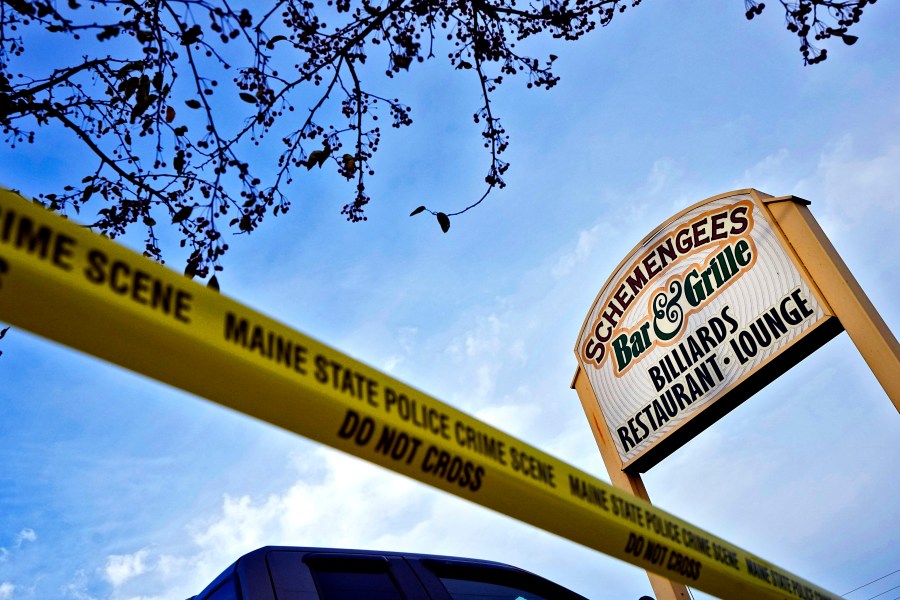 FILE - Crime scene tape still surrounds Schemengees Bar & Grille, Oct. 29, 2023, in Lewiston, Maine, the scene of a mass shooting. A survivor and family members of those killed in the deadliest mass shooting in Maine history went to Capitol Hill on Thursday, Dec. 7, to press for an inspector general to obtain answers from the Army about the mental health and hospitalization of a reservist who opened fire. (AP Photo/Matt York, File)